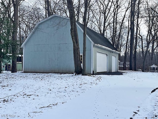 view of snow covered garage