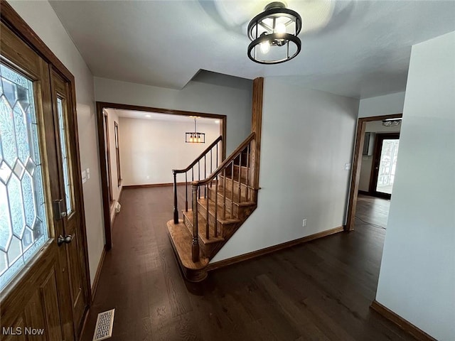 entrance foyer with dark wood-type flooring