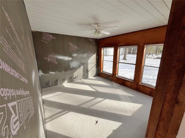 sunroom / solarium with ceiling fan