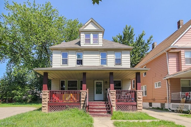 view of front of property featuring covered porch