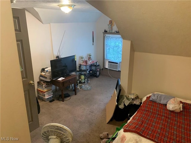 carpeted bedroom featuring a textured ceiling, cooling unit, and lofted ceiling