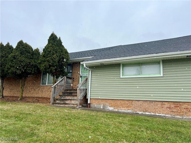 exterior space featuring a front yard