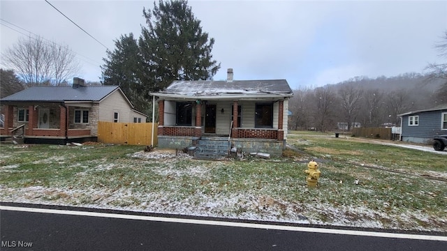 bungalow-style home with covered porch