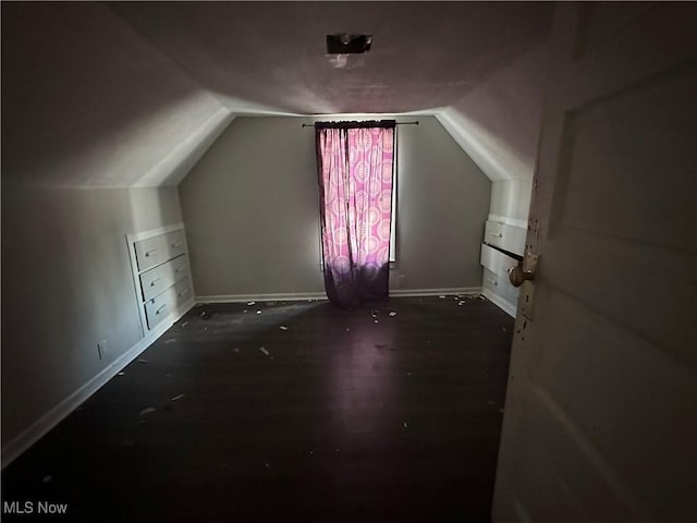 bonus room featuring lofted ceiling