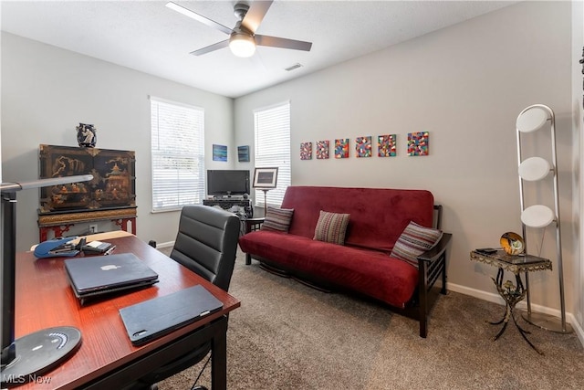 office with ceiling fan and carpet floors