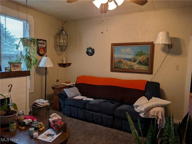 living room with ceiling fan