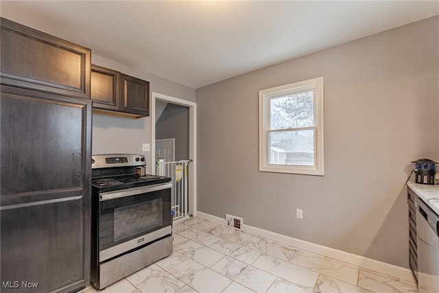 kitchen with dark brown cabinets and stainless steel electric range oven