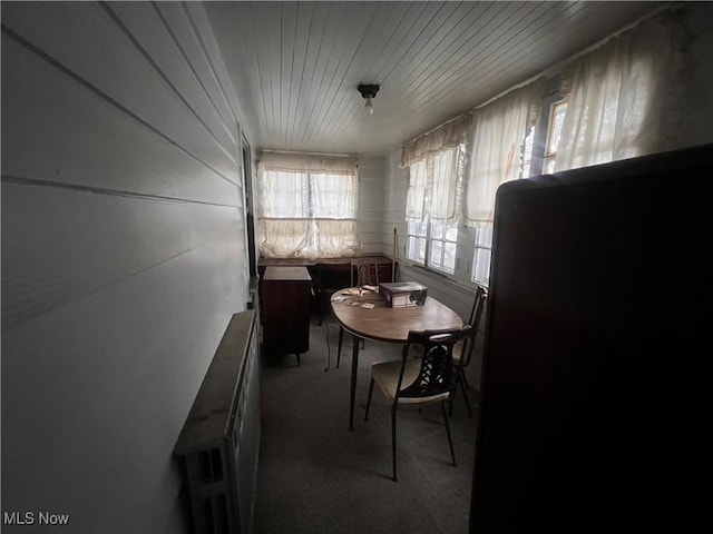 view of carpeted dining area