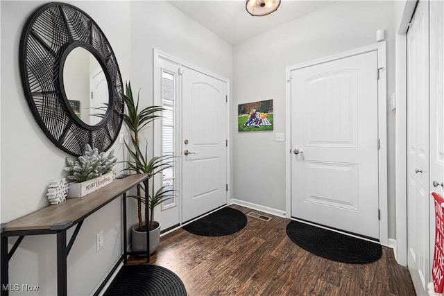 entryway with wood-type flooring