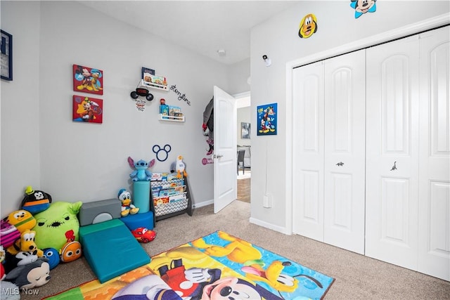 recreation room featuring light colored carpet