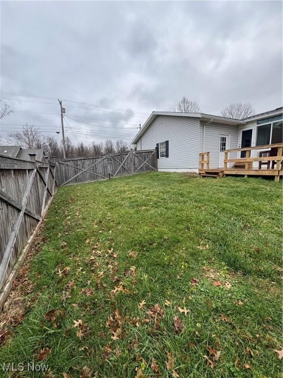 view of yard with a deck