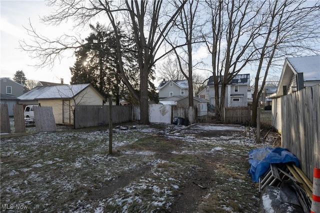 view of yard covered in snow