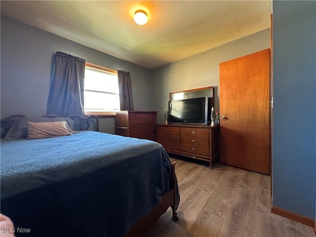 bedroom featuring light hardwood / wood-style flooring