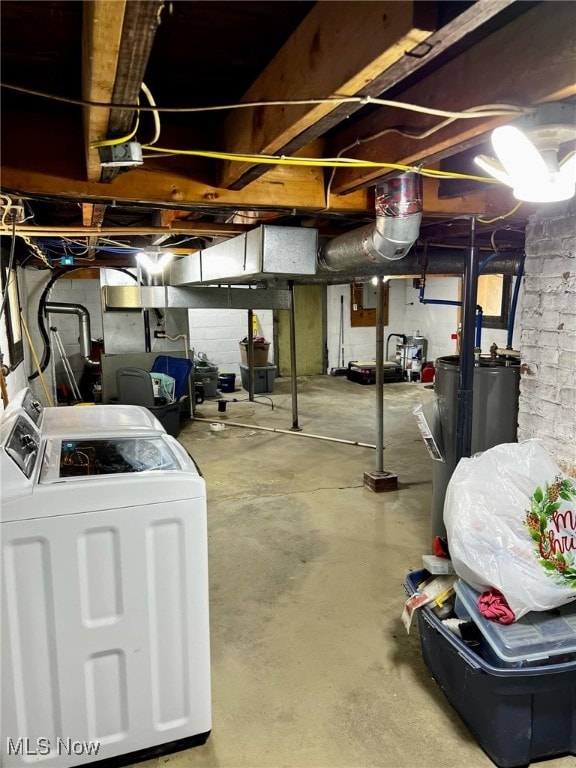 basement with washing machine and clothes dryer