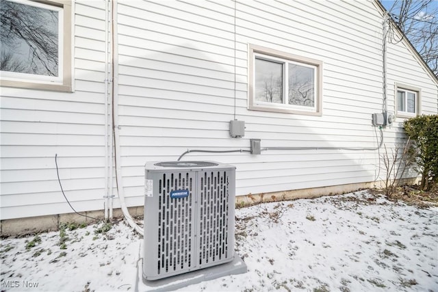 view of side of property with cooling unit