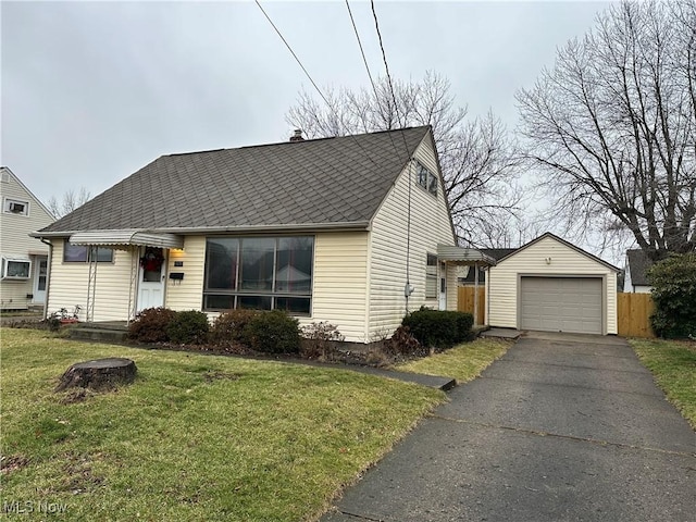 view of front of house featuring a garage and a front yard