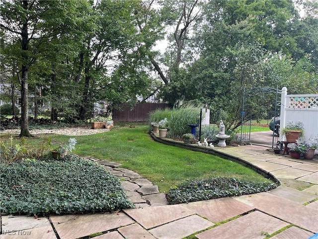 view of yard with fence