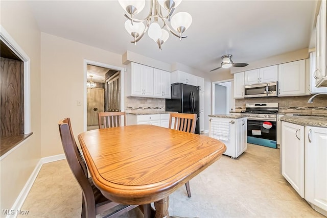 dining area with baseboards and ceiling fan with notable chandelier