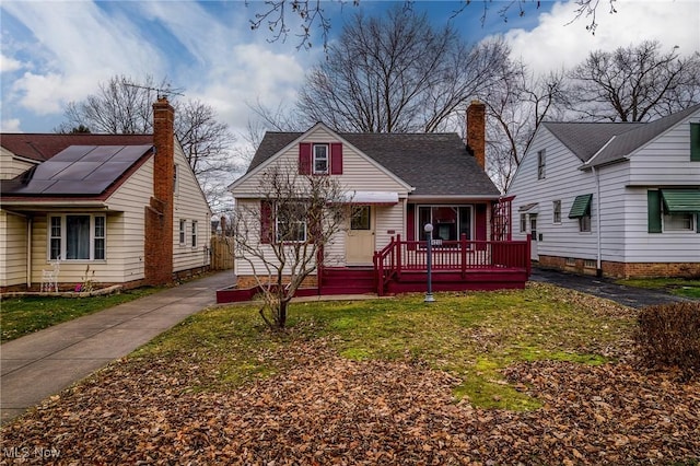 bungalow-style house with a porch and a front lawn