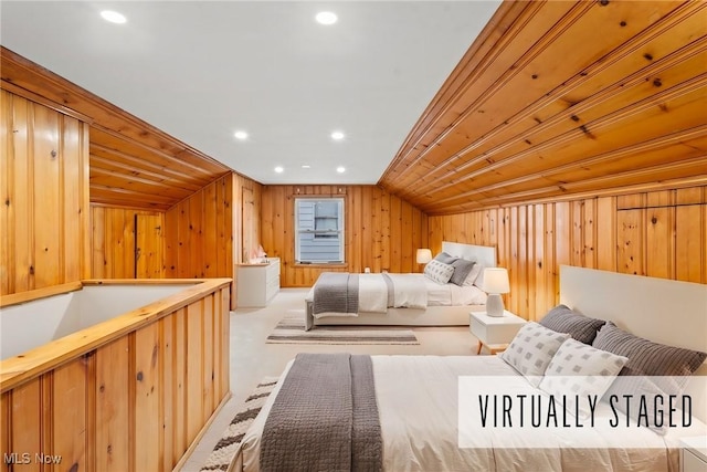 bedroom with wood walls, light colored carpet, wood ceiling, and vaulted ceiling