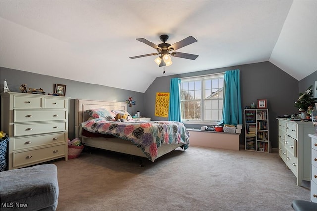 bedroom with light carpet, ceiling fan, and lofted ceiling