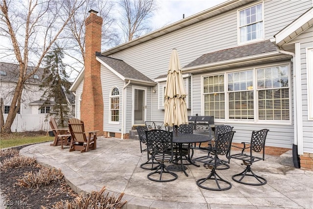 view of patio featuring a grill