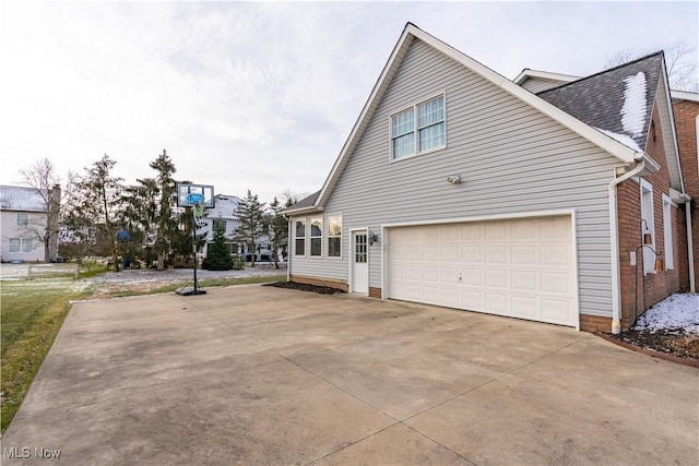 view of property exterior featuring a garage