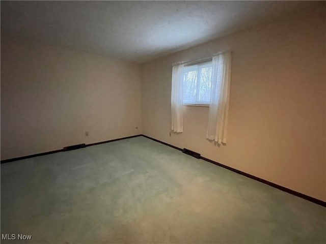 empty room with carpet floors