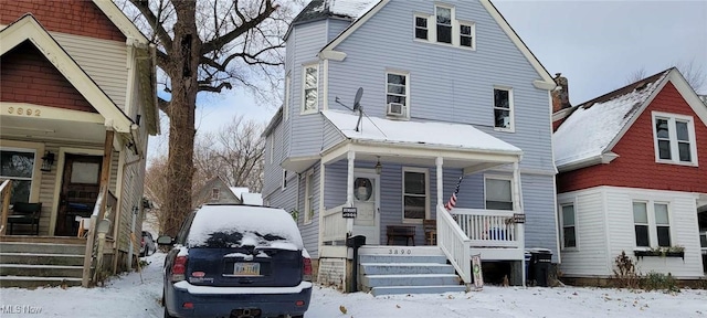 front of property with a porch