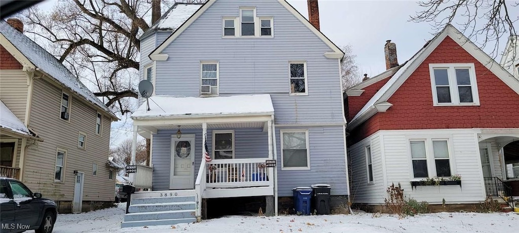 view of front of home featuring covered porch