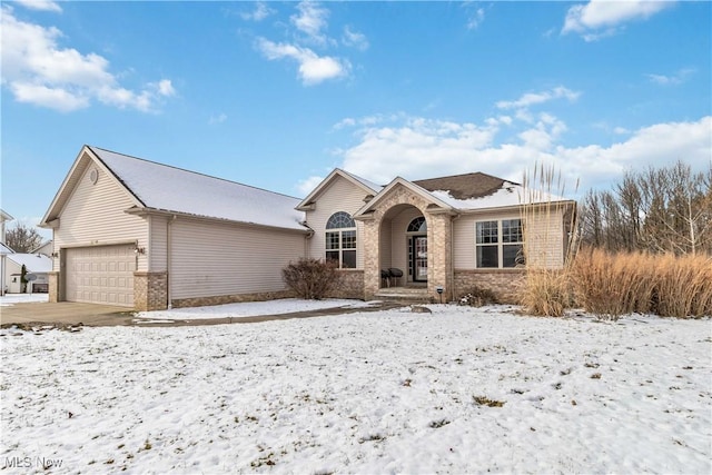 view of front of property with a garage