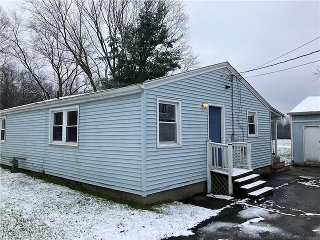 view of snow covered property