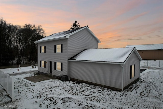 view of snow covered property