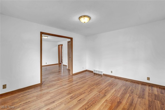 empty room featuring light wood-type flooring