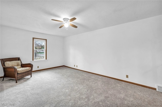 unfurnished room featuring carpet flooring and ceiling fan