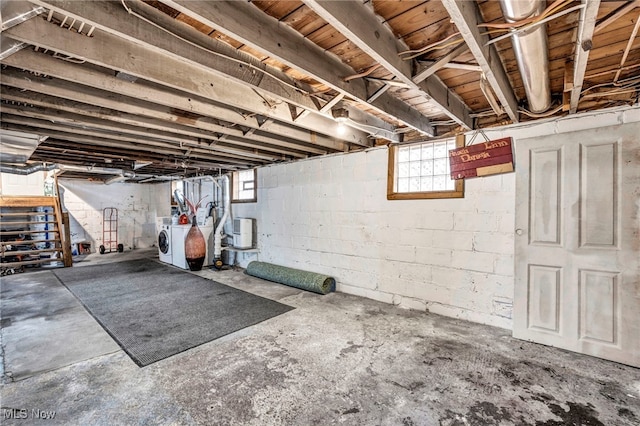 basement featuring washing machine and dryer