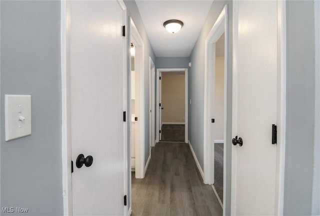 corridor featuring hardwood / wood-style flooring