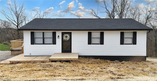 view of front of property with a deck