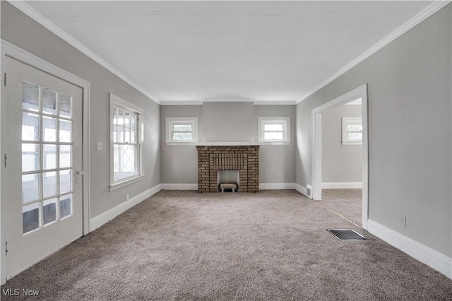 unfurnished living room featuring crown molding, light carpet, and a brick fireplace