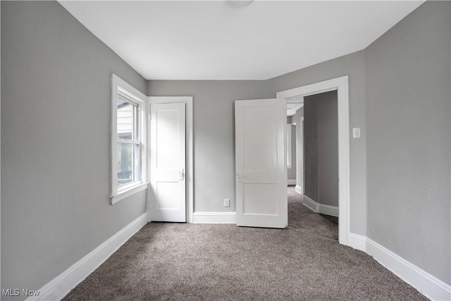 unfurnished bedroom featuring carpet floors