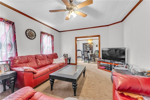 carpeted living room featuring plenty of natural light, ornamental molding, and ceiling fan