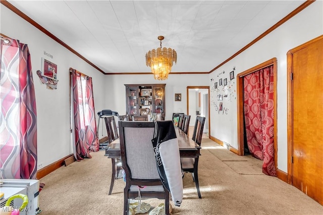 dining area with a notable chandelier, crown molding, and light carpet