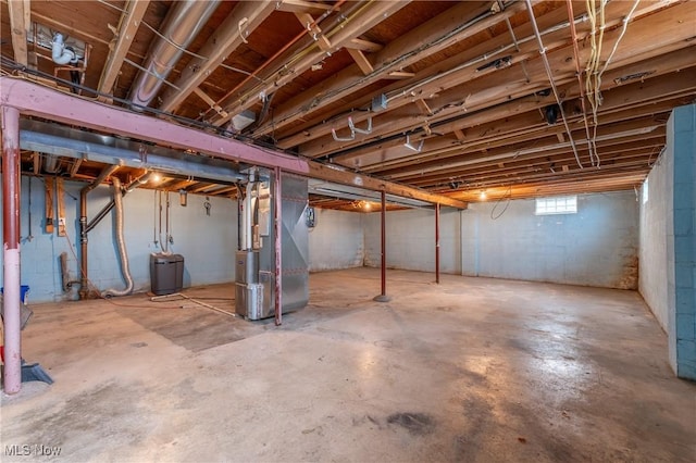 basement featuring heating unit