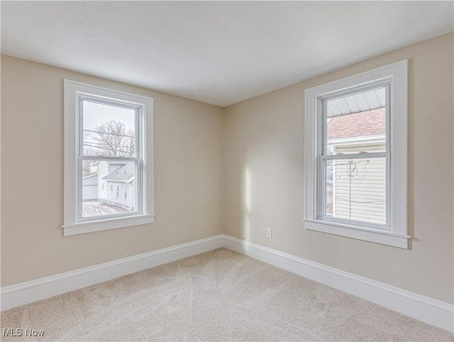 unfurnished room with carpet