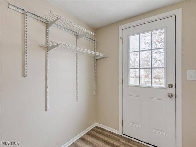 doorway featuring hardwood / wood-style flooring