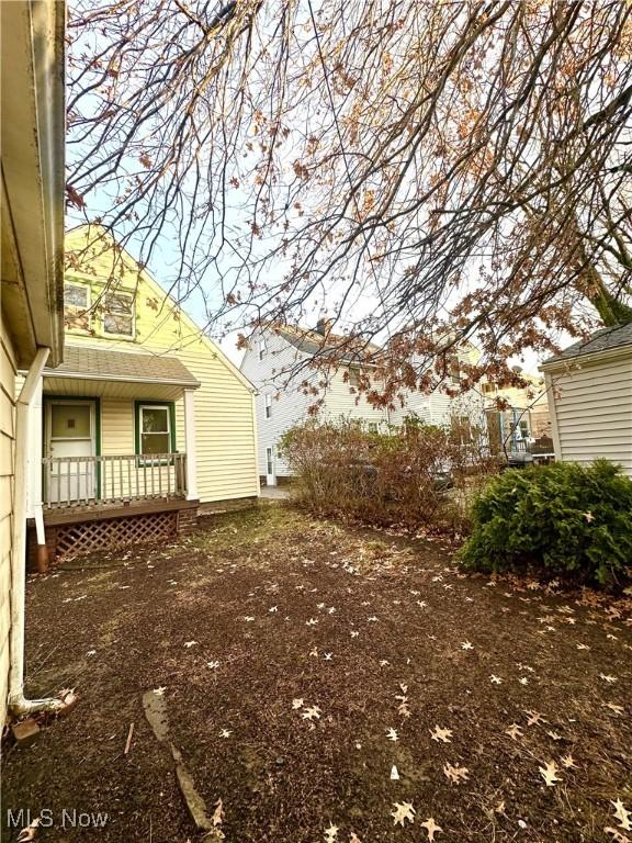 view of property exterior with covered porch