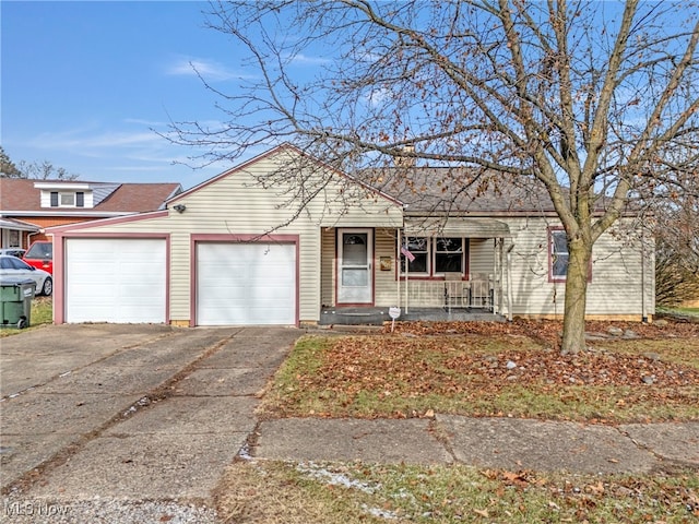 view of front of property featuring a porch and a garage