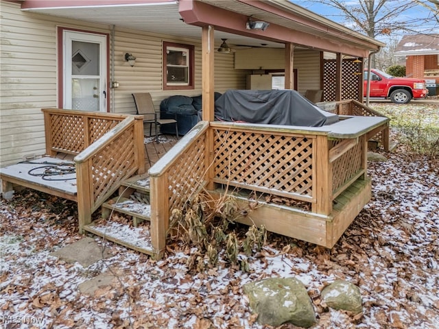 view of snow covered deck