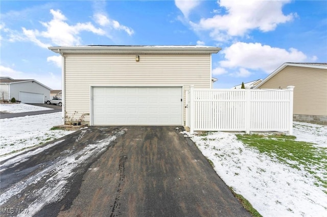 view of snow covered garage