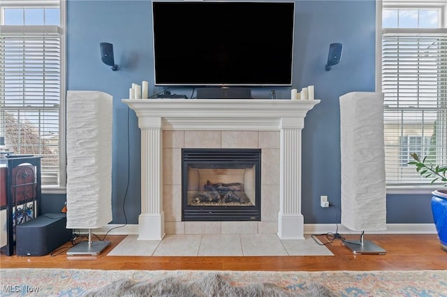 interior details with a tiled fireplace